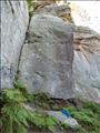 Earlwood. 'C', 24 (F7a+), takes the centre of this slab.
