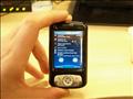 In-hand for size comparison, the O2 XDA Atom is endearingly pocket-sized